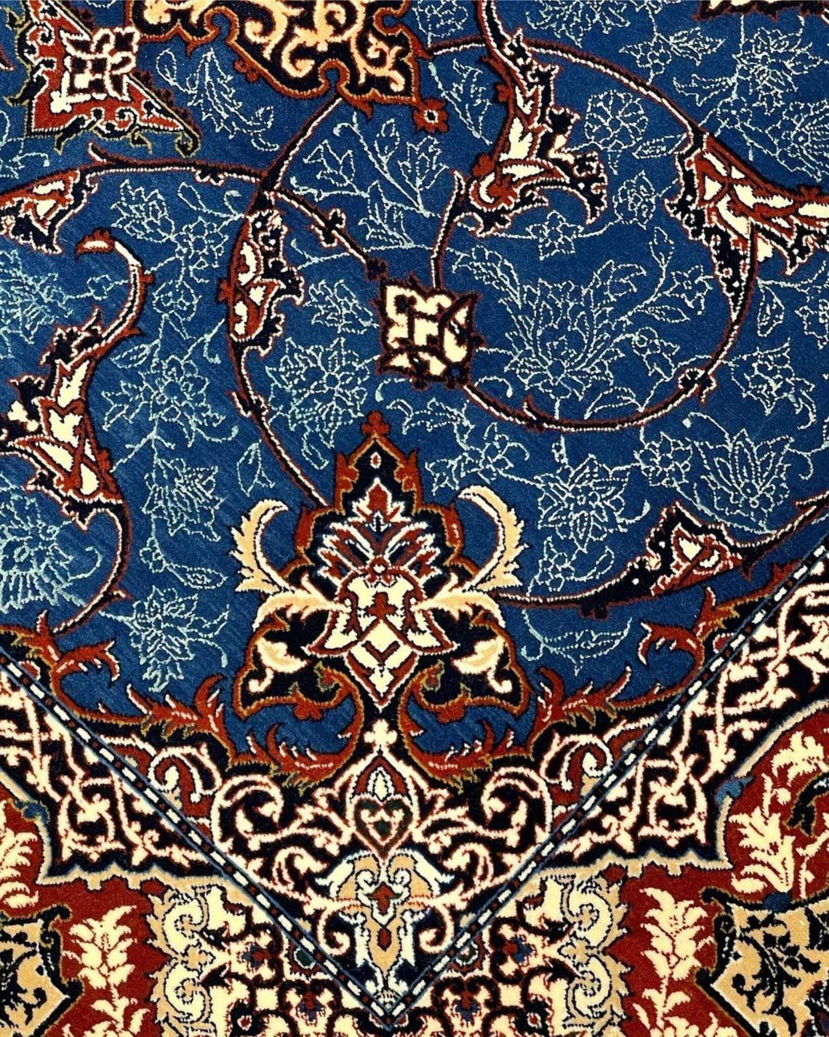Traditional Isfahan rug featuring silk foundation and exquisite floral details.